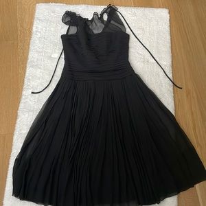 Used- Very good condition, wore 2 times, no wear and tear.